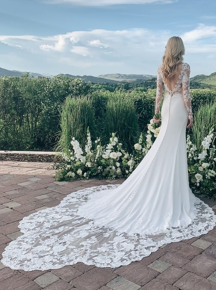 Chapel-length Petal Train Low Back Stretch Crepe Wedding Dress With Long Sleeves