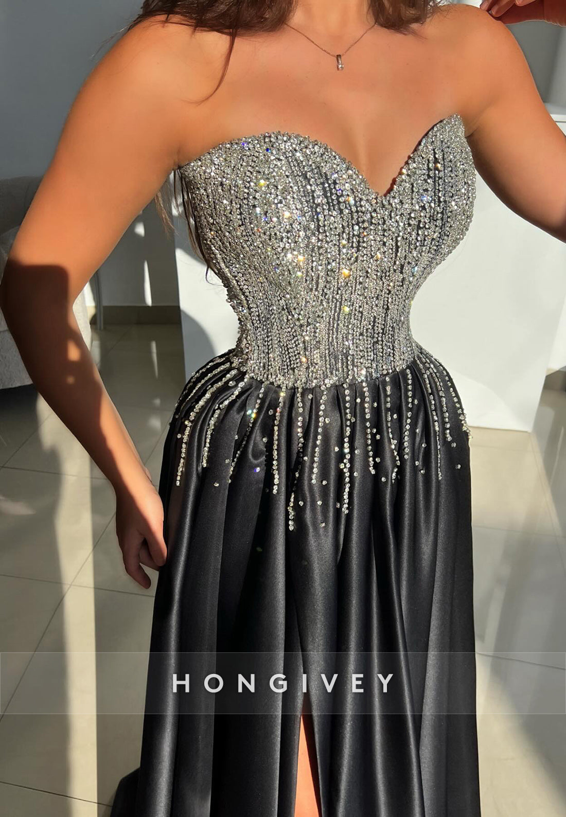 A-line Black Sleeveless Satin Sweetheart Appliqued Crystal Strapless Evening Gowns