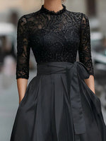 Elegant Black Lace Bodice Dress With Pleated Skirt