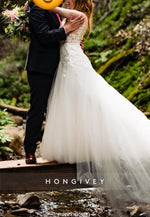 A-Line Tulle Low V-Neck Lace Spaghetti Straps Chapel Train Wedding Dresses