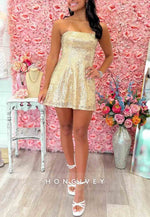 Gold Strapless Sequin Mini Homecoming Dress with Back Bow Detail
