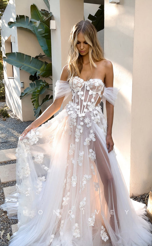 H0815 - Fully Floral Embroidered Sparkly Sheer With Tulle Train And High Slit Wedding Dress