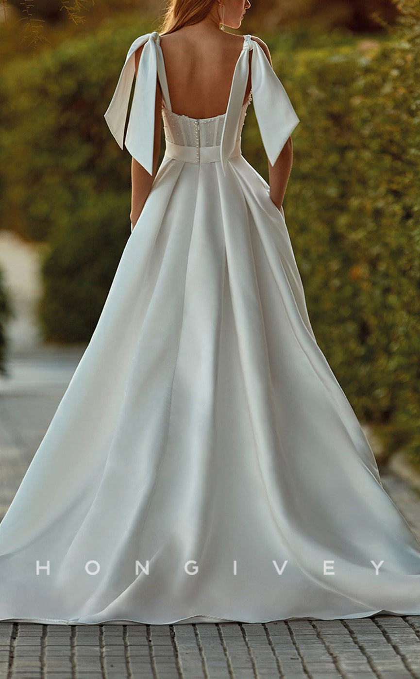 H0911 - Pearl Beaded With Train And Bow Detail Long Wedding Dress