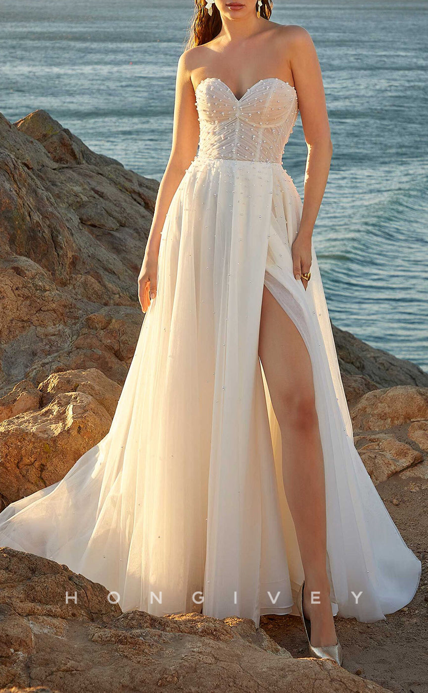 H1025 - Sleeveless Sweetheart Illusion Beaded With Bolero Long Beach Wedding Dress