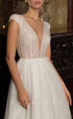 H1029 - Ornate Glitter Plunging Neck Cap Sleeves Beaded Long Wedding Dress