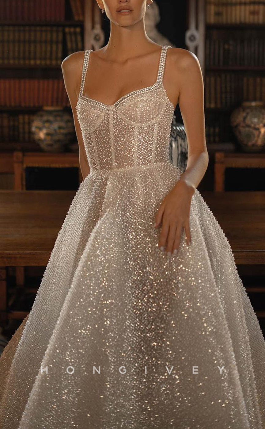 H1199 - Sexy A-Line Glitter Sweetheart Spaghetti Straps Empire Beaded With Train Wedding Dress