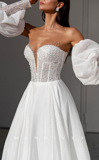 H1255 - Sexy A-Line Satin Sweetheart With Long Bell Sleeves Empire Beaded With Side Slit Wedding Dress