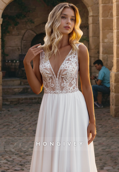 A-Line Sleeveless Sheer Appliques Beaded With Train Beach Wedding Dress