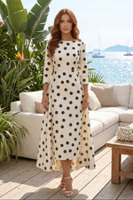 Polka Dot Midi Dress with Side Peplum Drape