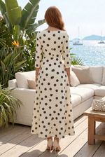 Polka Dot Midi Dress with Side Peplum Drape