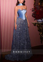 Elegant Blue Floor-Length Beaded Evening Gown Featuring A Velvet Corset