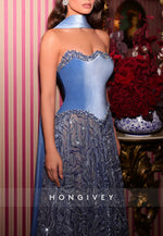 Elegant Blue Floor-Length Beaded Evening Gown Featuring A Velvet Corset